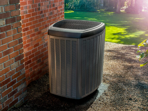 A heat pump in the backyard of a Ronkonkona home.