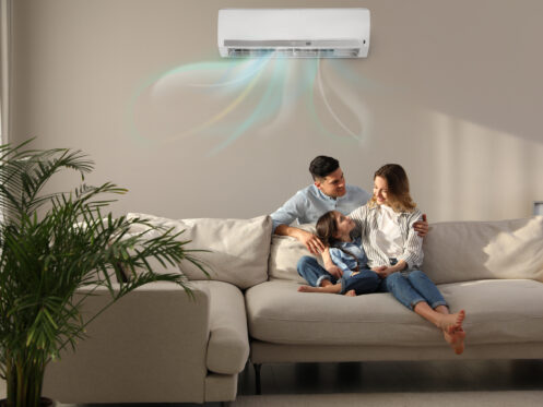 A young family cooling off under their ductless mini-split